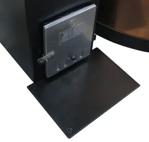 Plaque de protection incendie devant le poêle.